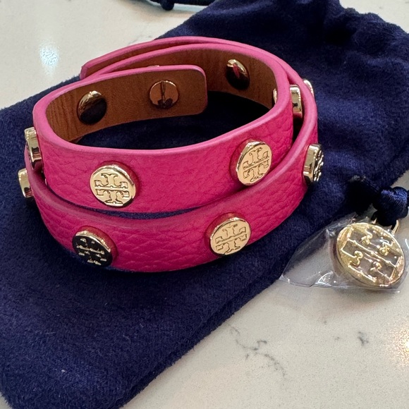Tory Burch Wrap Around Hot Pink Leather Bracelet.
Color: Hot Pink - Picture 3 of 4